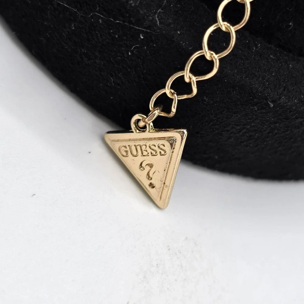 Guess Gold Tone Heart Locket Rose Charm Bangle Bracelet Adjustable Logo Tag